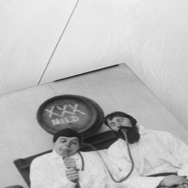 Two drunken men in a bed by Anonymous