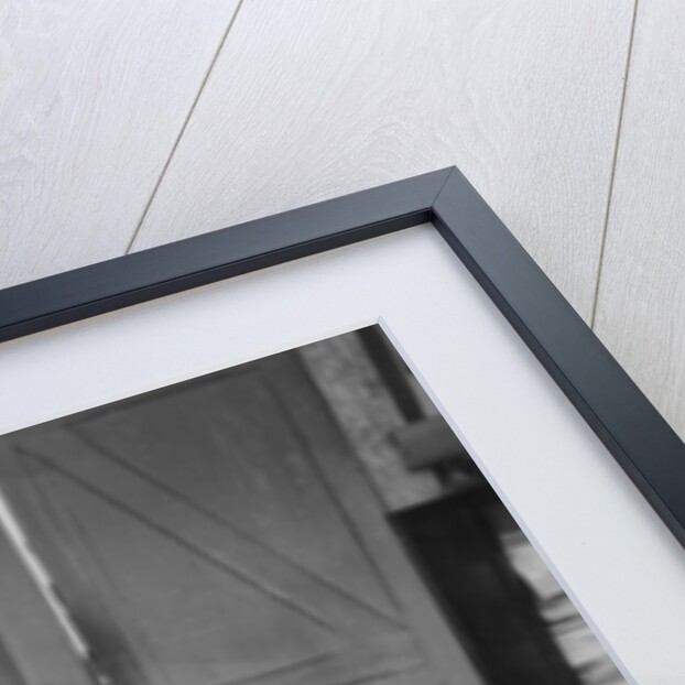 A young man sitting at a typewriter, Indonesia by Anonymous