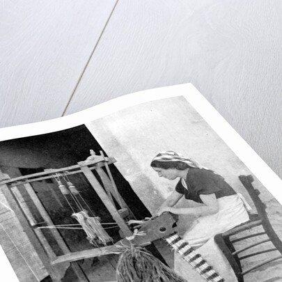 Woman weaving with straw on a hand loom, Fiesole, near Florence, Italy by Donald McLeish