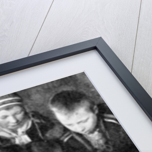 Lapp children looking at a globe by Anonymous