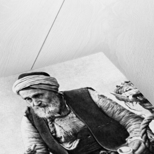 A peasant drinking coffee and smoking a huqqah, Izmir, Turkey by Anonymous