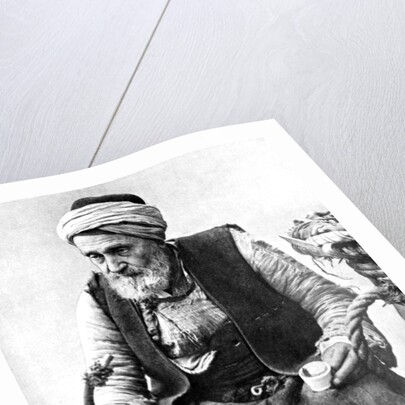 A peasant drinking coffee and smoking a huqqah, Izmir, Turkey by Anonymous