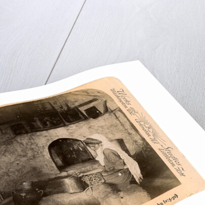 A Samaritan woman at Jacob's Well, Palestine by Underwood & Underwood