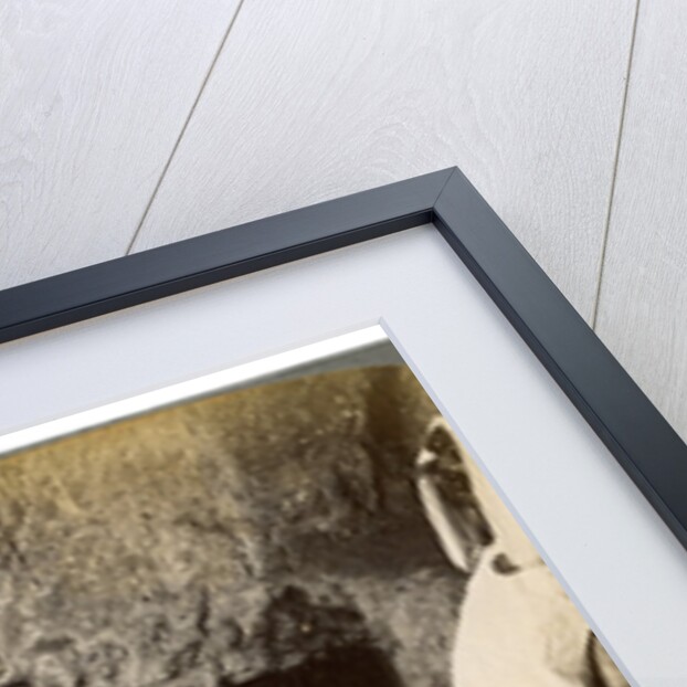 A tomb with the entrance stone rolled away, Jerusalem by Underwood & Underwood