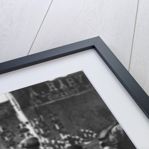 A coconut shy during a bank holiday on Blackheath Common, London by Hall