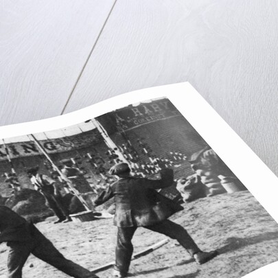 A coconut shy during a bank holiday on Blackheath Common, London by Hall