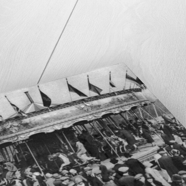 A merry-go-round, part of a bank holiday carnival on Hamstead Heath, London by Anonymous