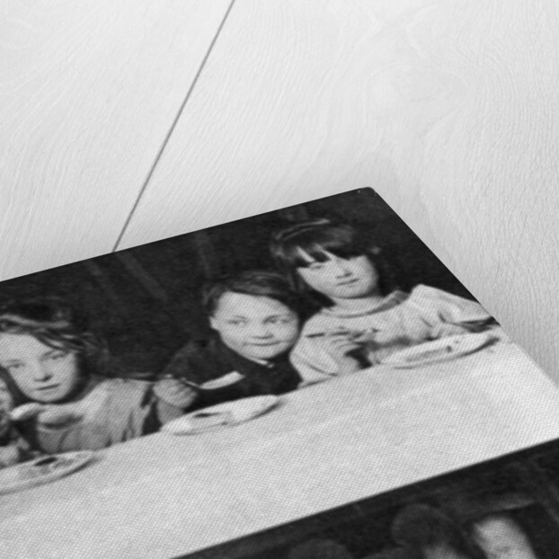 East End children being fed by a charitable organisation, London by Anonymous