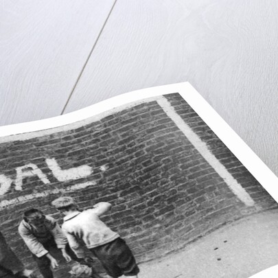 Football in the East End, London by Anonymous