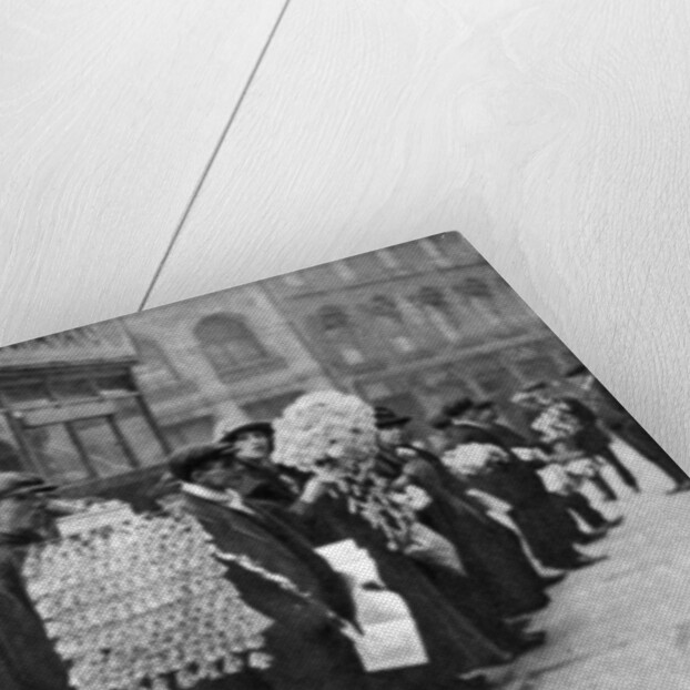 Street hawkers selling football favours in Walham Green, London by Anonymous