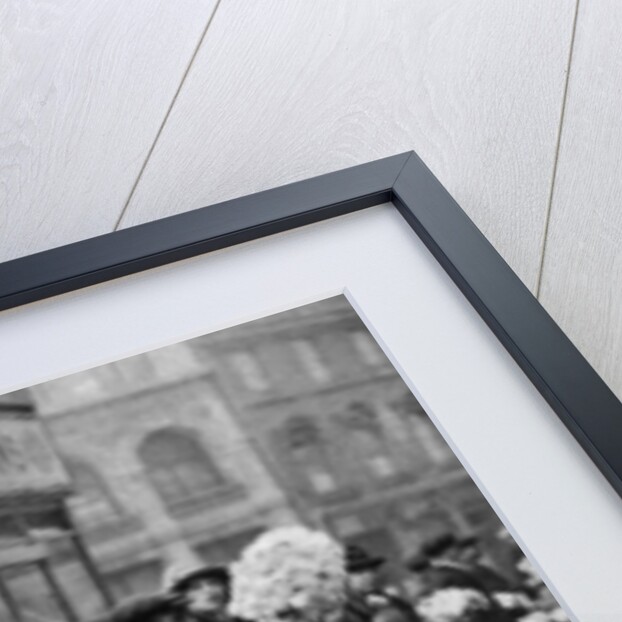 Street hawkers selling football favours in Walham Green, London by Anonymous