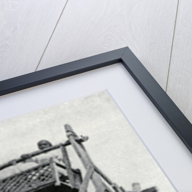 Arabian children enjoying a 'big-wheel' by Anonymous