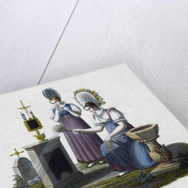 Two women standing before a headstone in a graveyard by Anonymous
