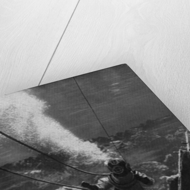 The first photograph of a diver under water by Anonymous