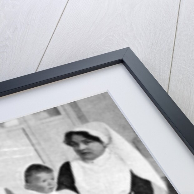 Wounded children from Ypres with nurses at La Panne, Belgium, First World War by Anonymous