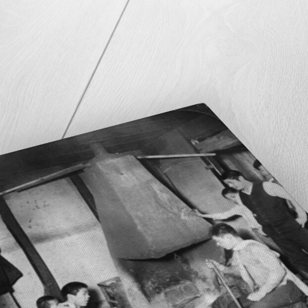 A Japanese blacksmith at his forge, Yokohama, Japan by Underwood & Underwood