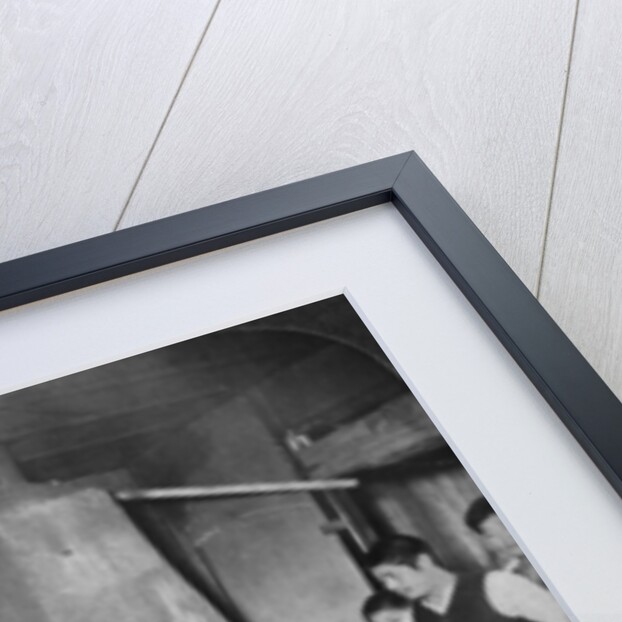 A Japanese blacksmith at his forge, Yokohama, Japan by Underwood & Underwood