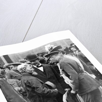 King George V and Queen Mary with a shipwright, Birkenhead, First World War by Anonymous