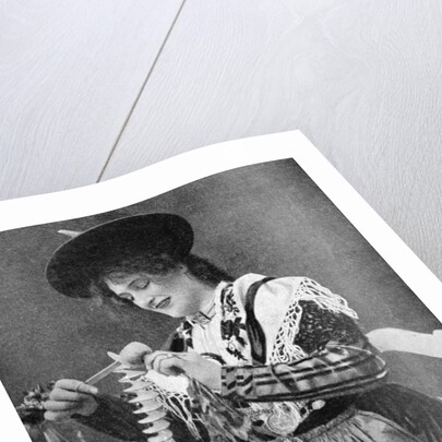 A woman creatively peeling a potato by Georg Haeckel