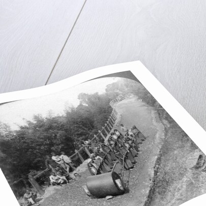 A woman work team on the Darjeeling highway, India by Underwood & Underwood