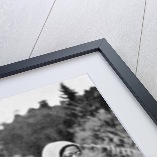 A Nepalese woman with her child by Anonymous