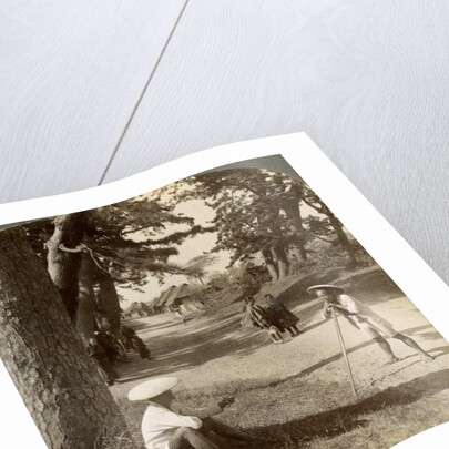 Travellers resting under the pines at Suzukawa, old post road from Tokyo to Kyoto, Japan by Underwood & Underwood