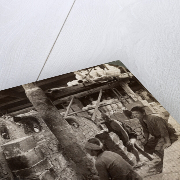 Workmen watching kilns full of Awata porcelain, Kinkosan works, Kyoto, Japan by Underwood & Underwood