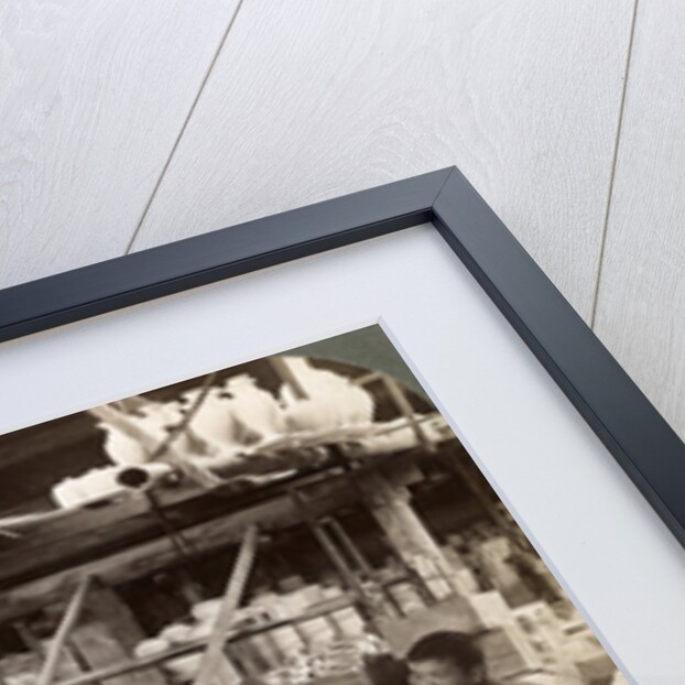Workmen watching kilns full of Awata porcelain, Kinkosan works, Kyoto, Japan by Underwood & Underwood