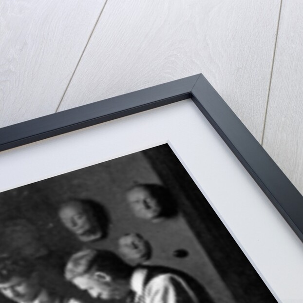 In Professor Herkomer's enamelling studio, grinding colours by Anonymous