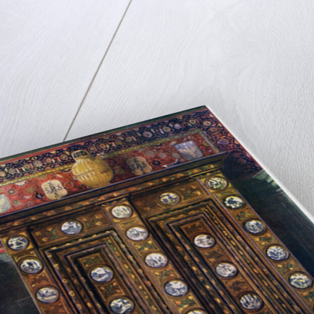 Walnut kas inlaid and with painted medallions of Delft ware by Edwin Foley