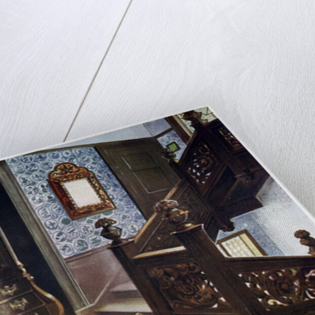 Carved walnut bombe armoire with chased mounts by Edwin Foley