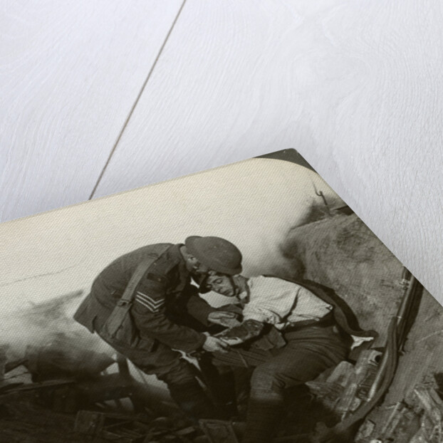 Soldier receiving first aid from a sergeant in a sap, Battle of Peronne, World War I by Realistic Travels Publishers