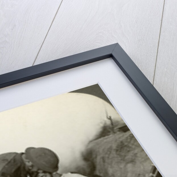 Soldier receiving first aid from a sergeant in a sap, Battle of Peronne, World War I by Realistic Travels Publishers