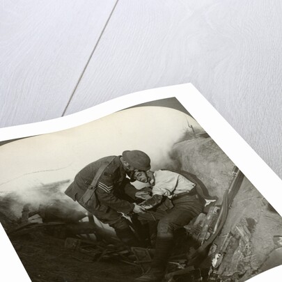 Soldier receiving first aid from a sergeant in a sap, Battle of Peronne, World War I by Realistic Travels Publishers