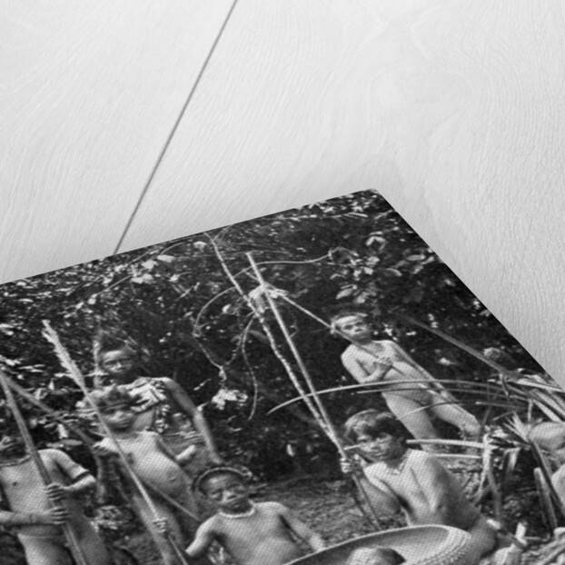 Indians of the Putumayo River with a decapitated head, Amazonia by Anonymous