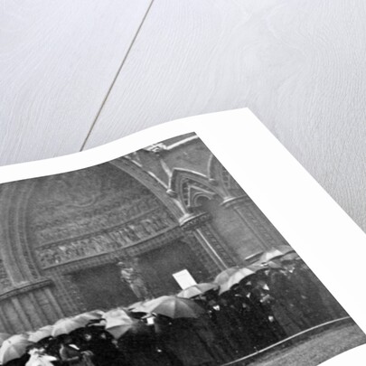 People waiting in the rain in order to attend a service at Westminster Abbey, London by Anonymous