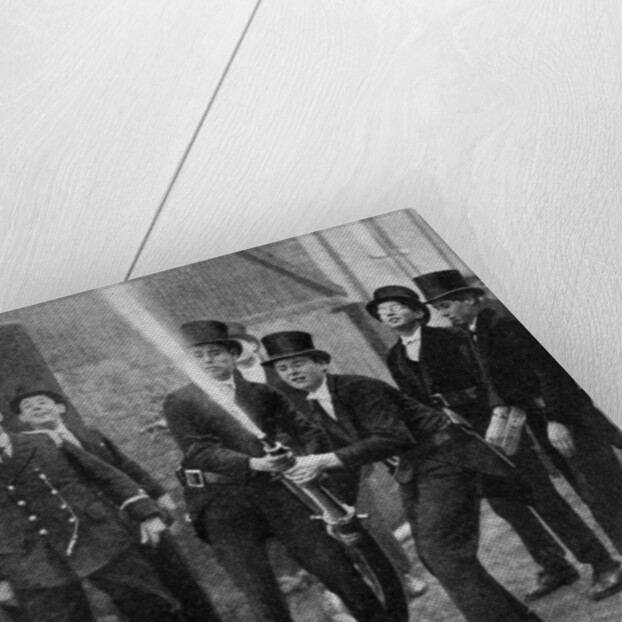 Eton's amateur firemen practising a hose drill, Berkshire by Anonymous