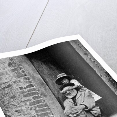 A child with her grandfather, England by AW Cutler