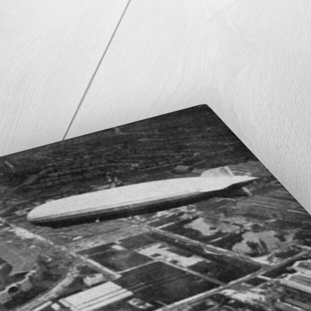 German airship 'Graf Zeppelin' flying over Wembley during the FA Cup Final, London by Central Press
