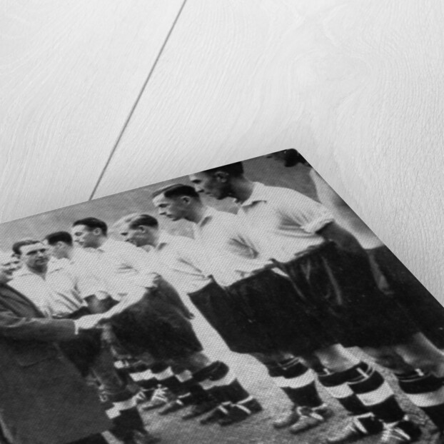 Winston Churchill greets the England football team, Wembley, London, October 1941 by London News Agency