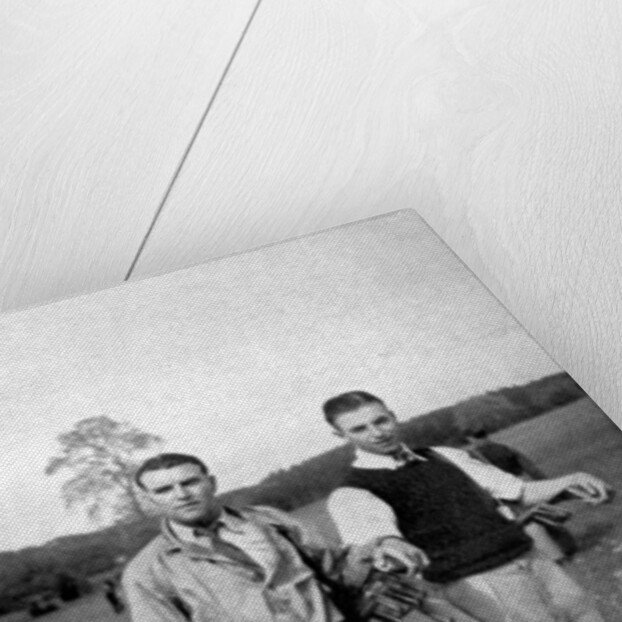 Stanley Matthews and Eddie Hapgood pause between shots during a round of golf by Anonymous