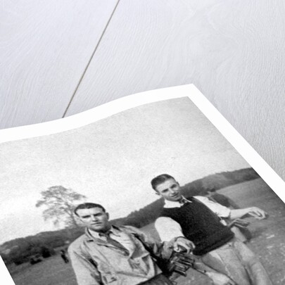 Stanley Matthews and Eddie Hapgood pause between shots during a round of golf by Anonymous
