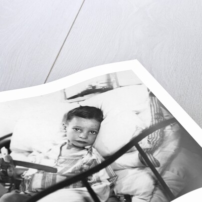 Greek boy from Pylos being nursed in the sick bay of the British battleship HMS Malaya by Anonymous
