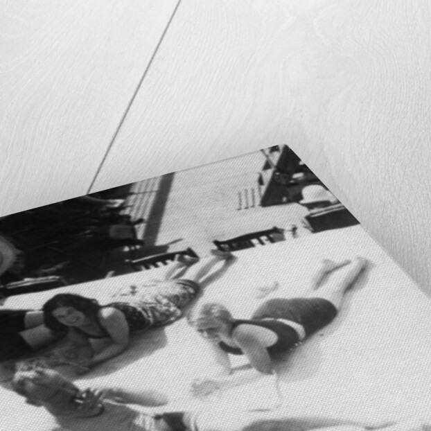 Passengers sunbathing on board a cruise ship by Anonymous