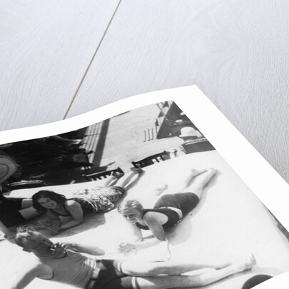 Passengers sunbathing on board a cruise ship by Anonymous