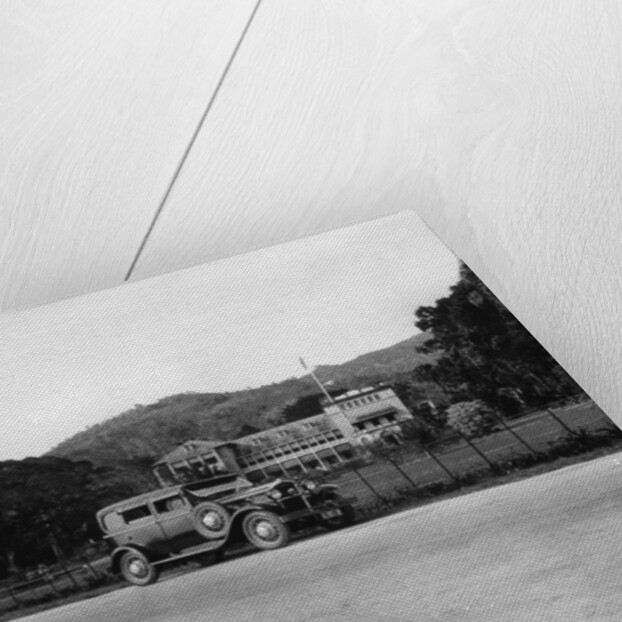 A Singer car in front of the Governor's house, Trinidad, Trinidad and Tobago by Anonymous