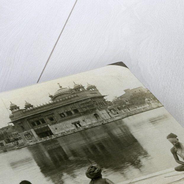 Fakirs at Amritsar, looking south across the Sacred Tank to the Golden Temple, India by Underwood & Underwood
