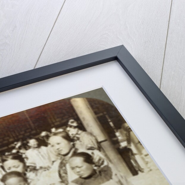 A group of women in the courtyard of a wealthy Chinese house, Peking, China by Underwood & Underwood