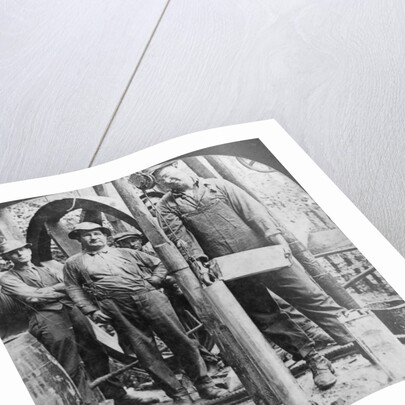 Filling a shell with nitro-glycerine, oil field in Pennsylvania, USA by Keystone View Company