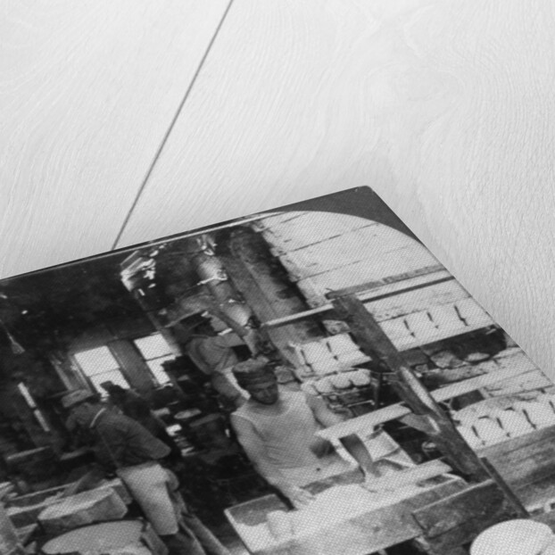 Firing tableware in the Noted Pottery Centre, Trenton, New Jersey, USA by Keystone View Company